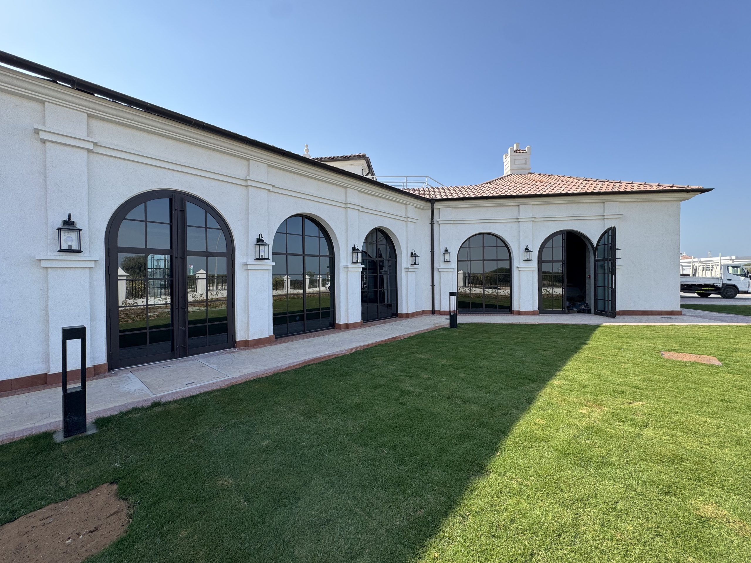 Villa with arched aluminium-framed glass doors, Abu Dhabi